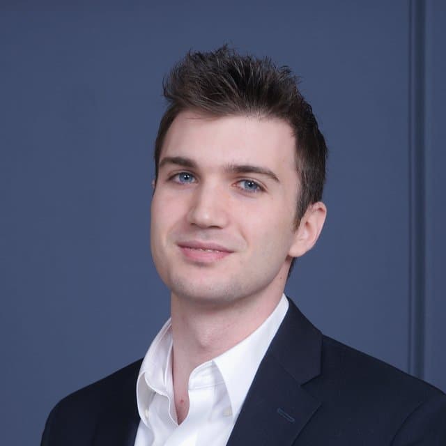 Professional headshot of James Leone